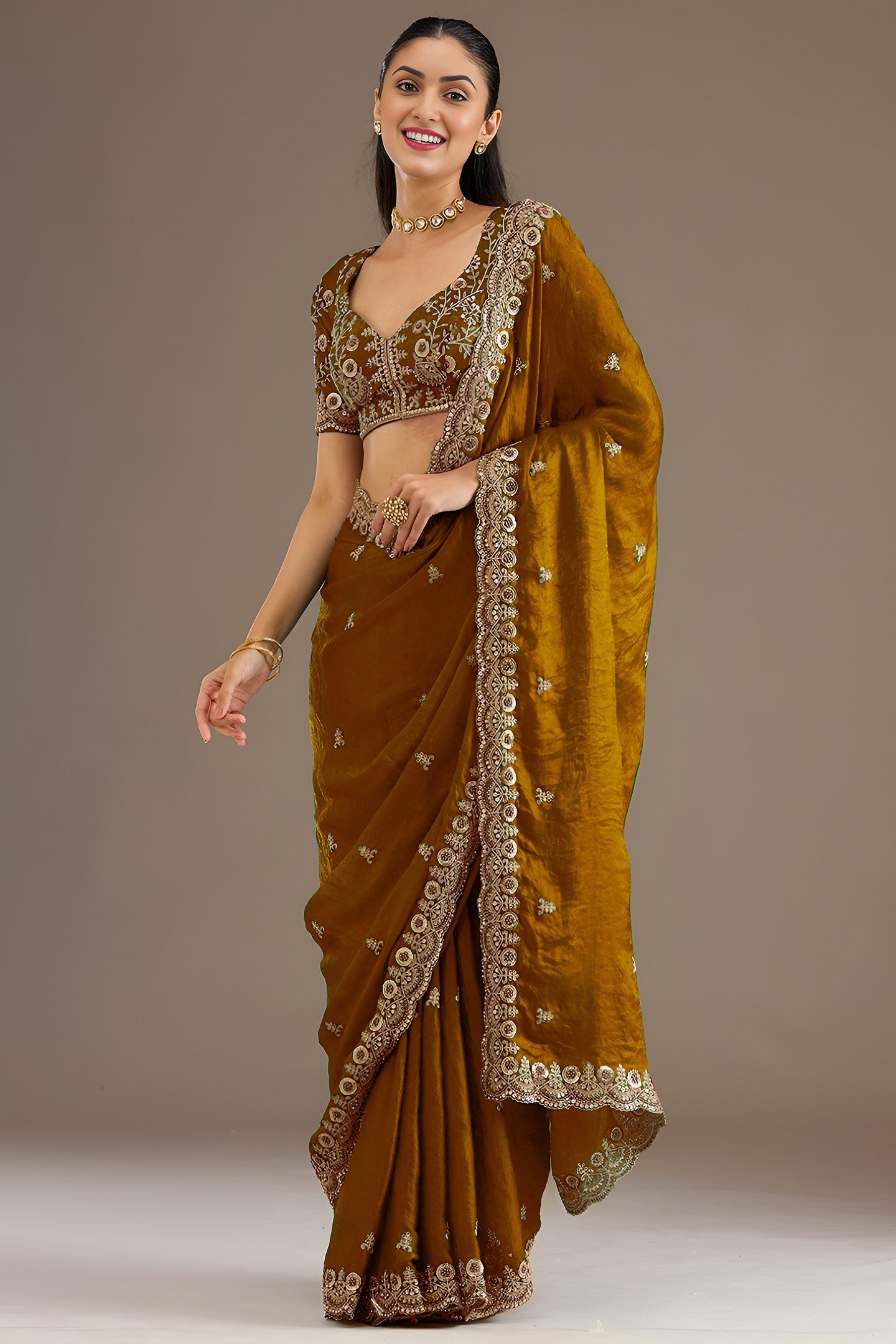 Gold Tissue Saree with Stitched Blouse in Pearl and Zari Work