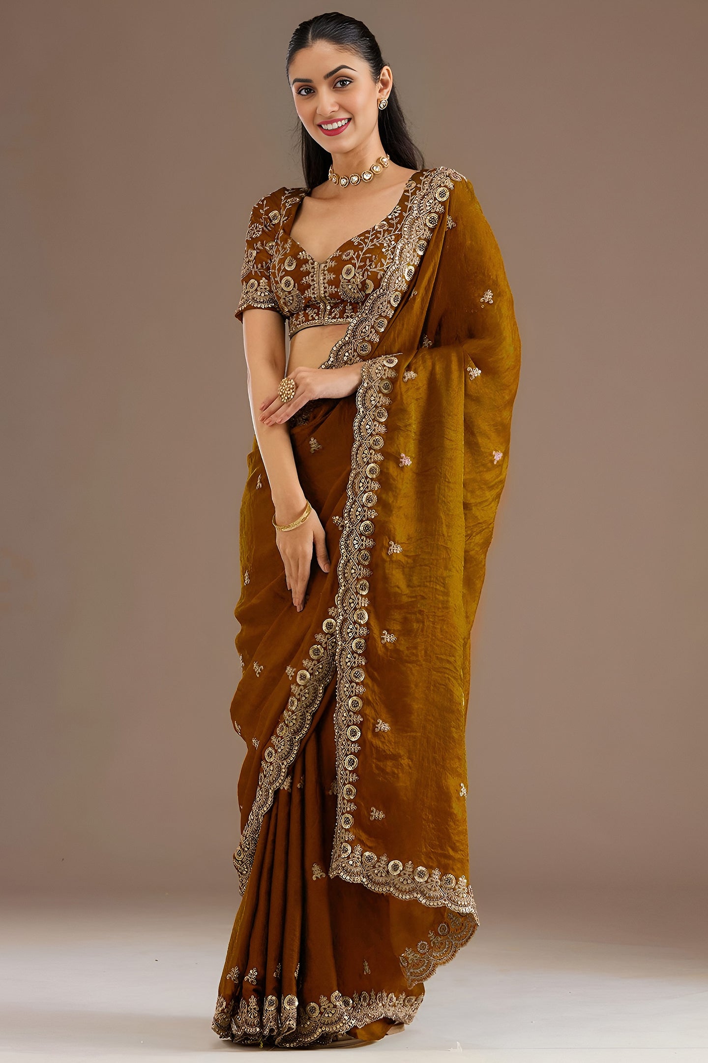 Gold Tissue Saree with Stitched Blouse in Pearl and Zari Work