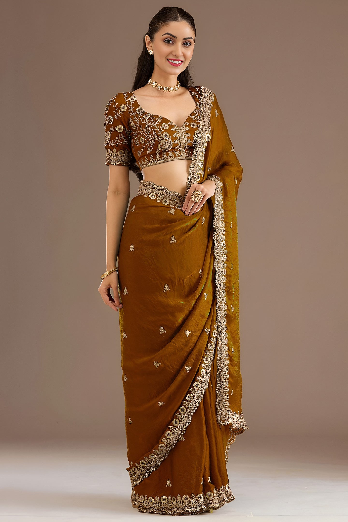 Gold Tissue Saree with Stitched Blouse in Pearl and Zari Work