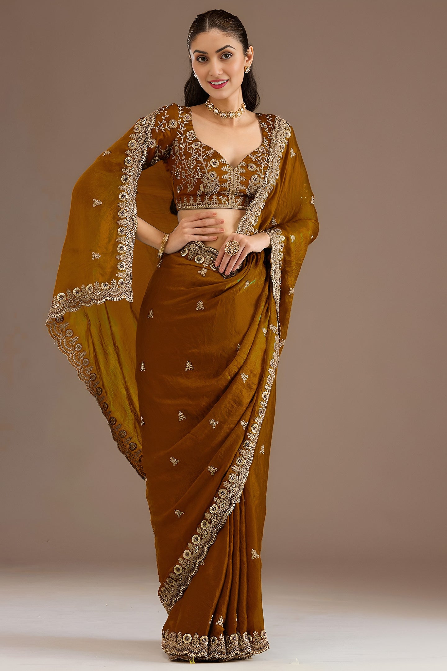 Gold Tissue Saree with Stitched Blouse in Pearl and Zari Work
