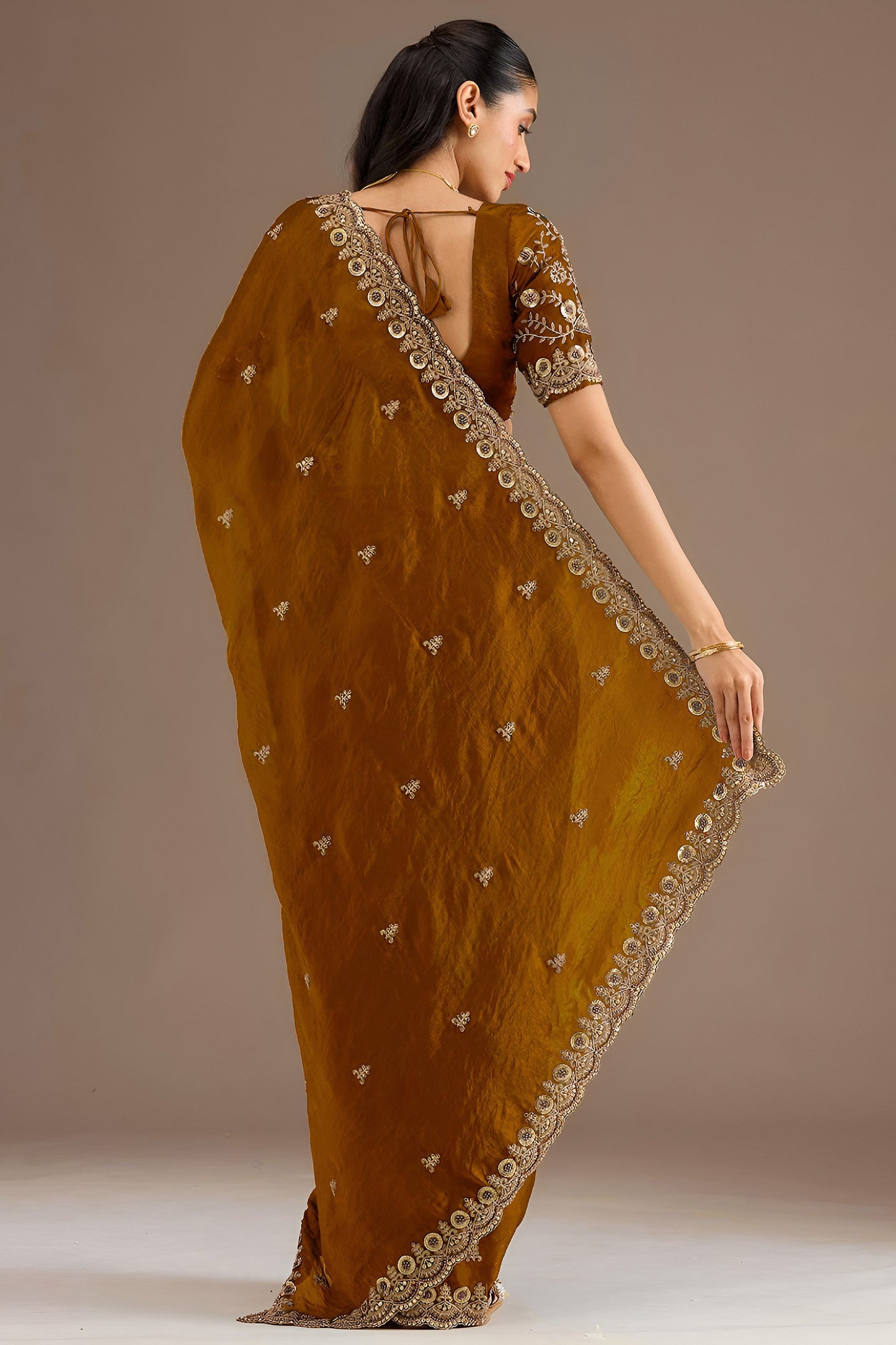 Gold Tissue Saree with Stitched Blouse in Pearl and Zari Work