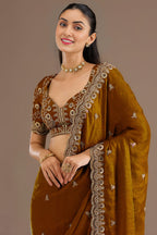 Gold Tissue Saree with Stitched Blouse in Pearl and Zari Work