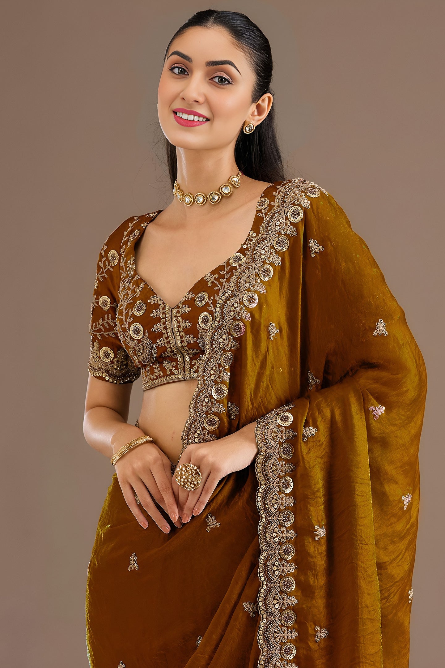 Gold Tissue Saree with Stitched Blouse in Pearl and Zari Work
