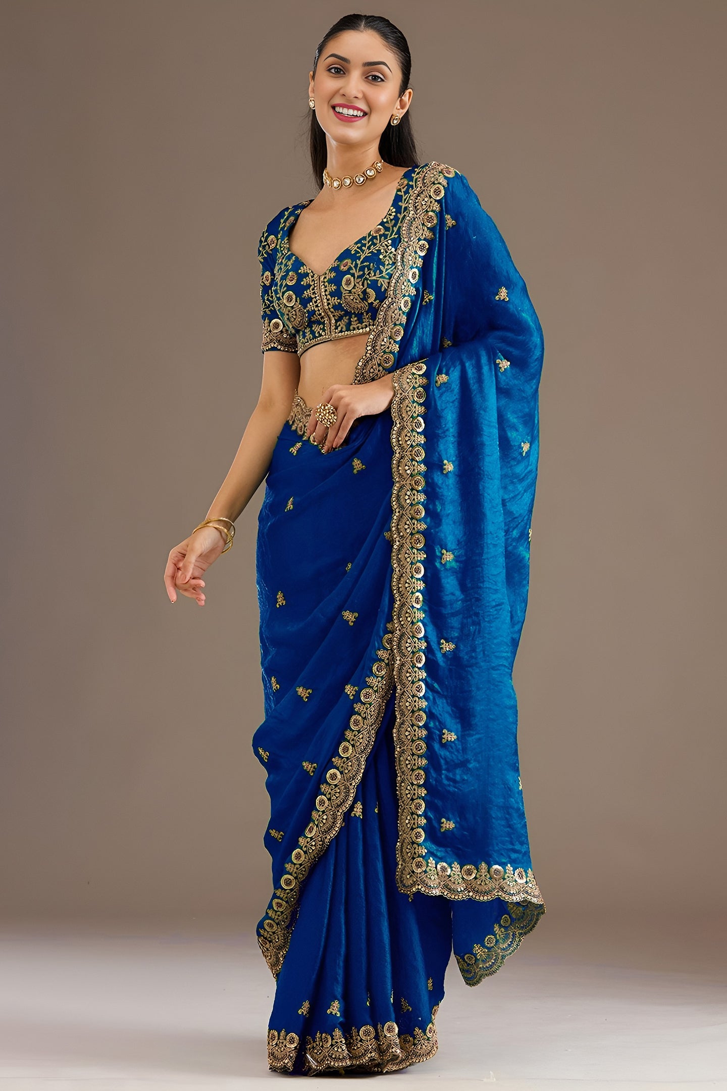 Royal Blue Tissue Saree with Stitched Blouse featuring Sequin, Zari and Pearl Work