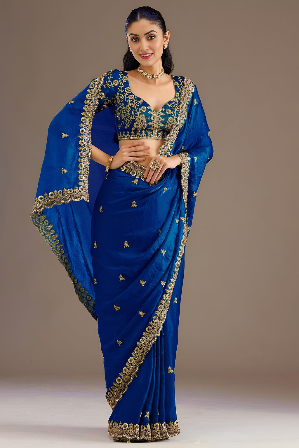 Royal Blue Tissue Saree with Stitched Blouse featuring Sequin, Zari and Pearl Work