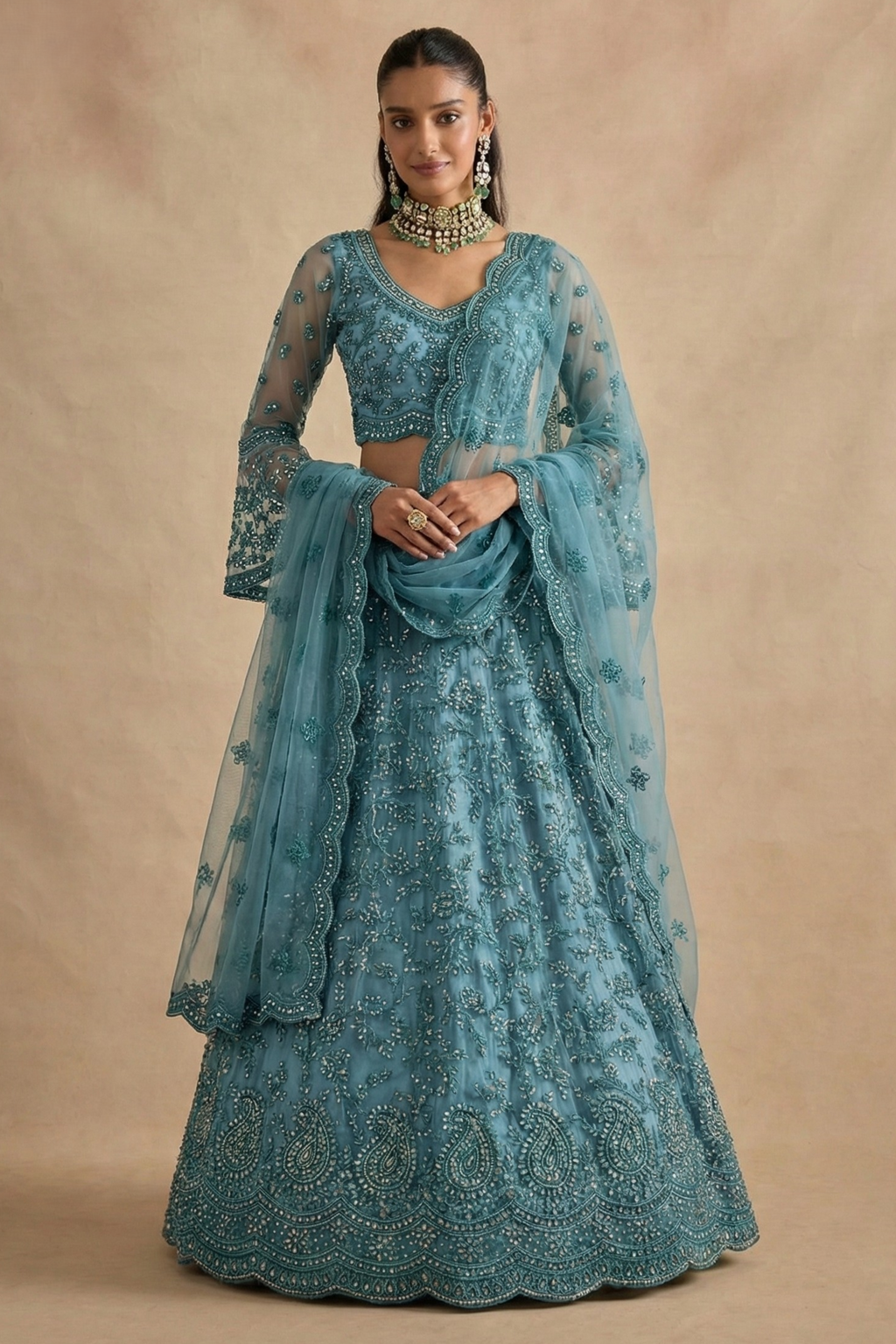 Full front view of the teal lehenga choli with long sheer sleeves and scalloped net dupatta — a refined long sleeve lehenga with thread and stone embroidery.
