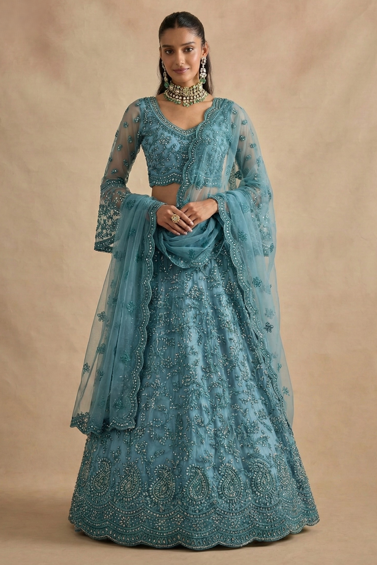 Full front view of the teal lehenga choli with long sheer sleeves and scalloped net dupatta — a refined long sleeve lehenga with thread and stone embroidery.