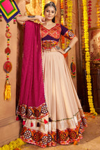 Beige Viscose Rayon Chaniya Choli For Navratri Garba Indian Festivals 9 Meter Flair - Embroidery Work, Real Mirror Work, Print Work