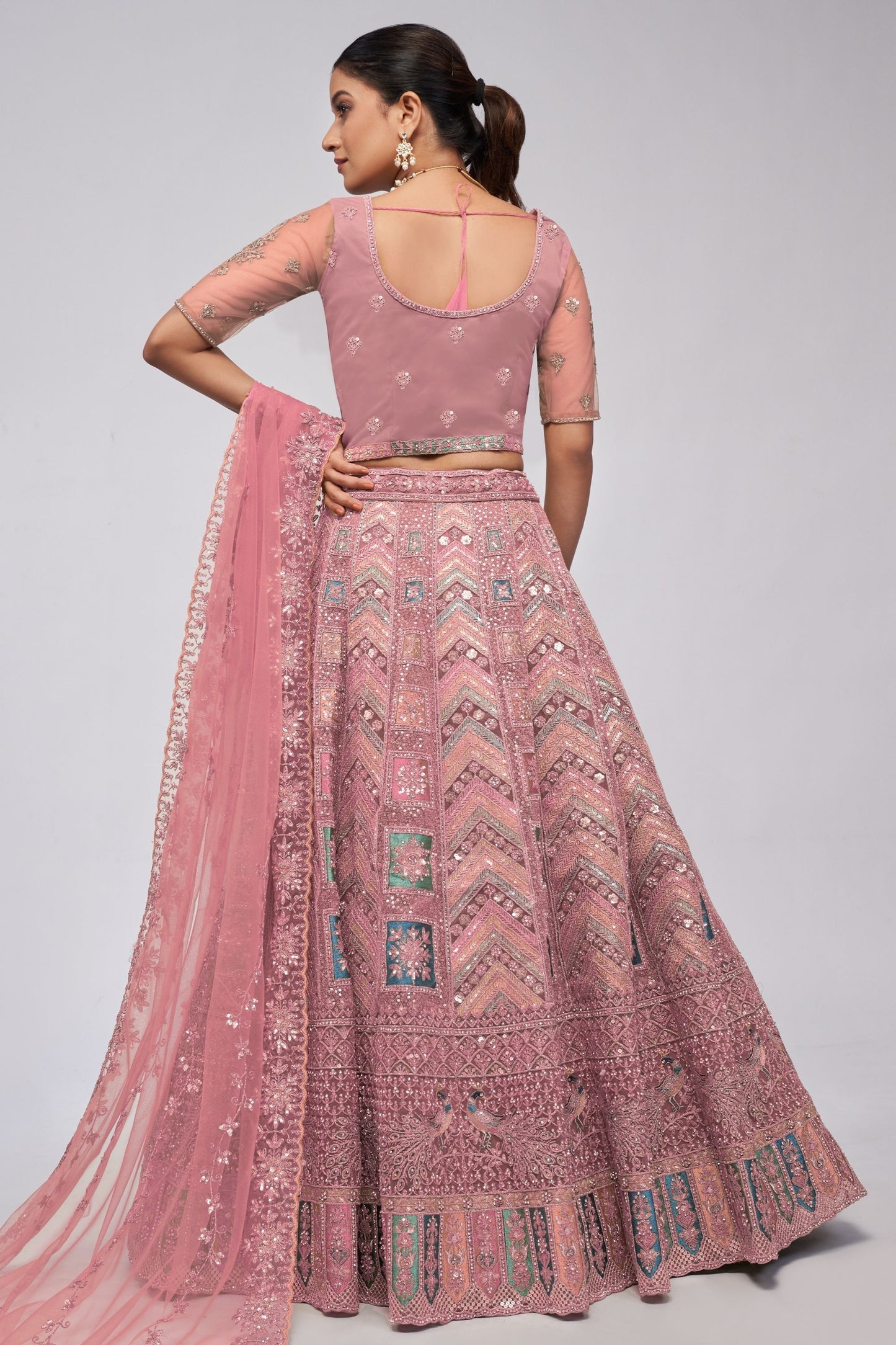 Rose Gold Soft Net Lehenga Choli For Indian Festivals & Weddings - Sequins Work, Dori Work, Zarkan Work, Thread Work