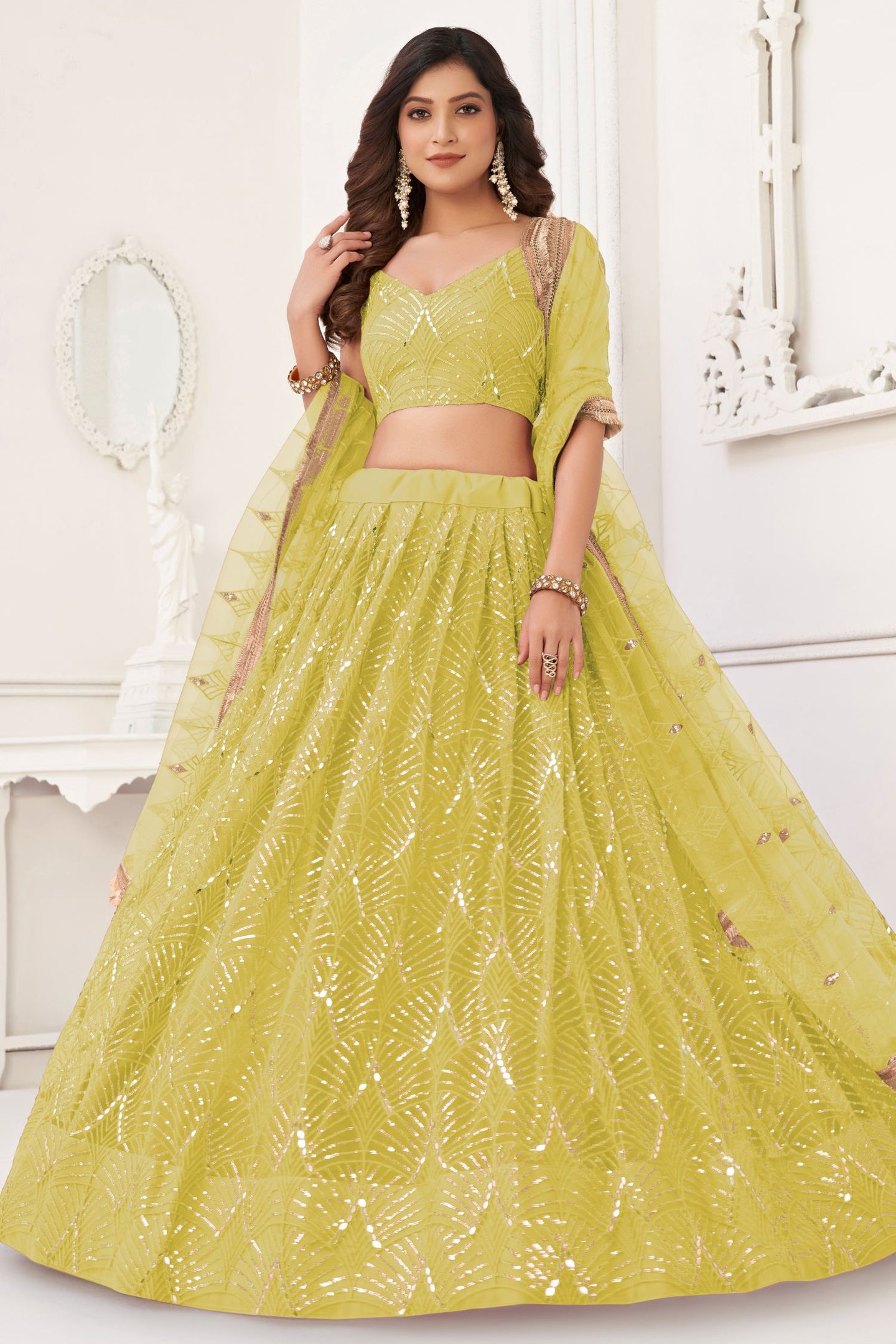 Yellow Net Lengha Dress for Engagement with Mirror Work