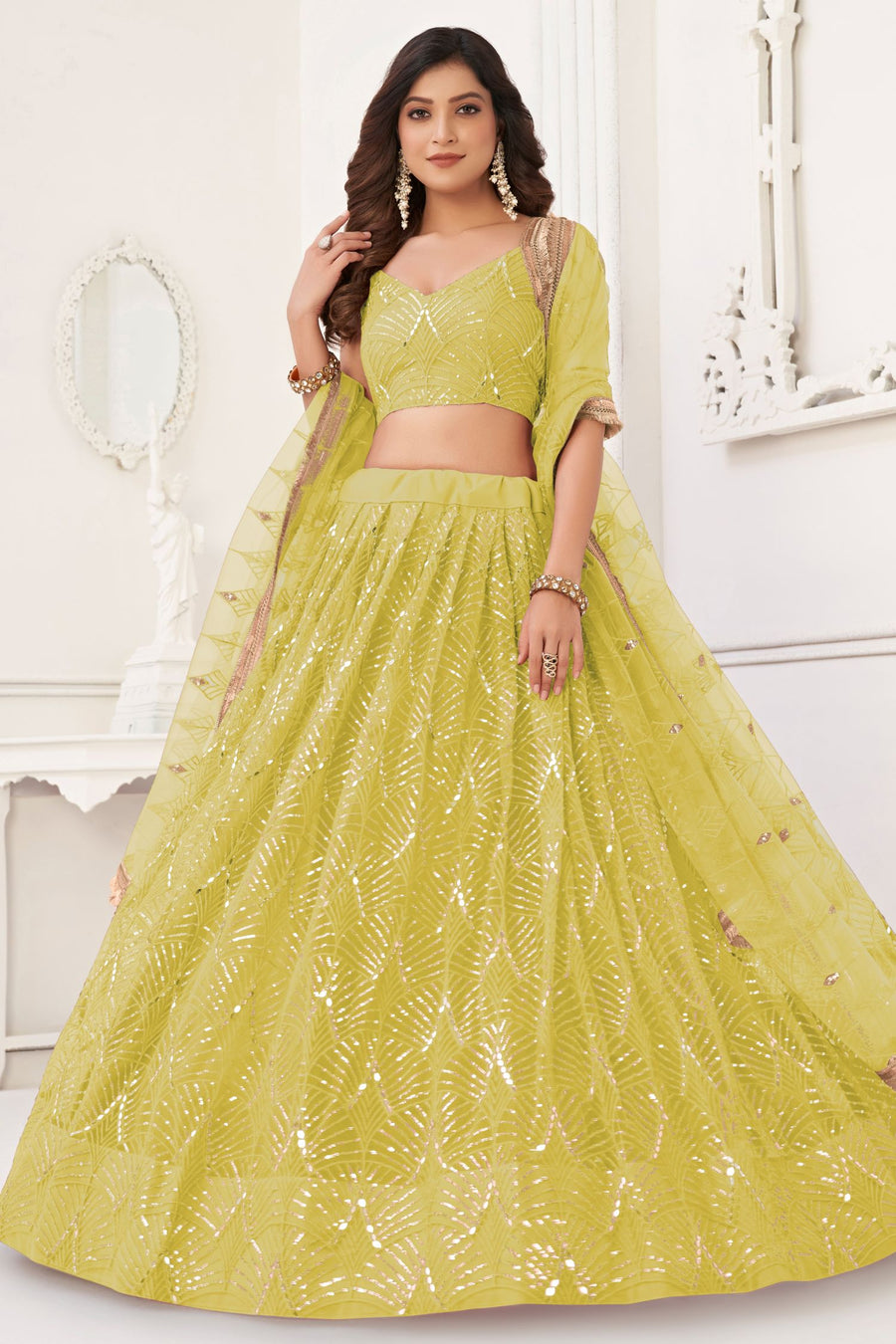 Yellow Net Lengha Dress for Engagement with Mirror Work