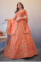 Light Orange Net Lehenga Choli For Indian Festivals & Wedding - Sequence Embroidery Work