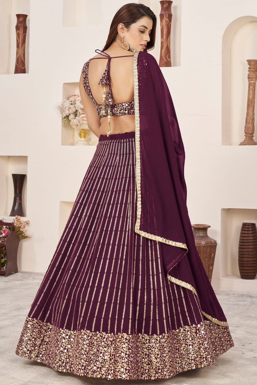 Wine Georgette Embroidered Lehenga Choli with Zari Work