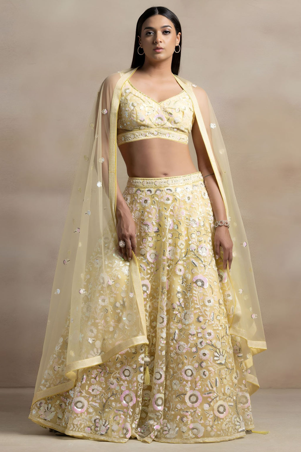 Yellow Net Pastel Lehenga Choli with Sequins and Thread Work
