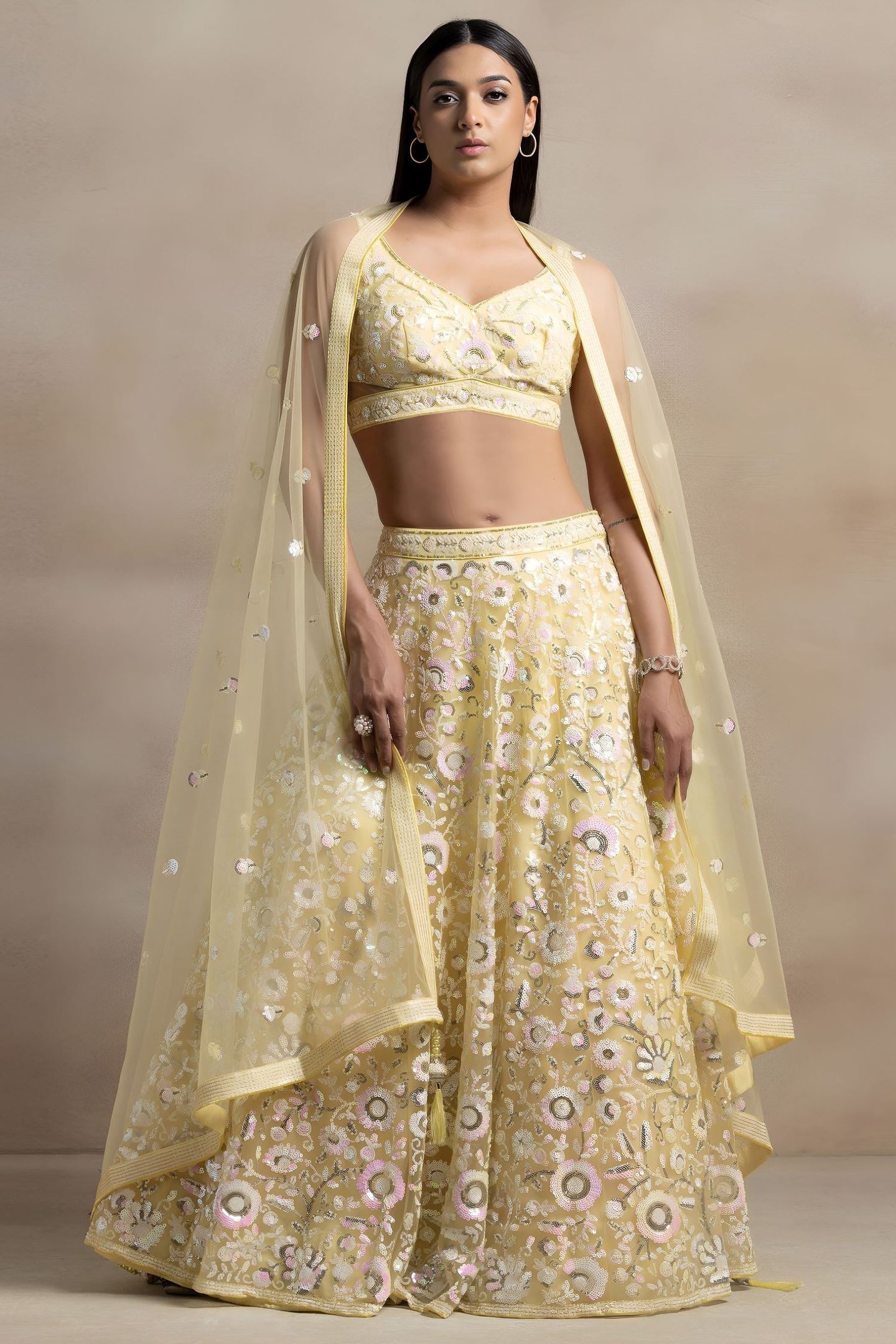 Yellow Net Pastel Lehenga Choli with Sequins and Thread Work