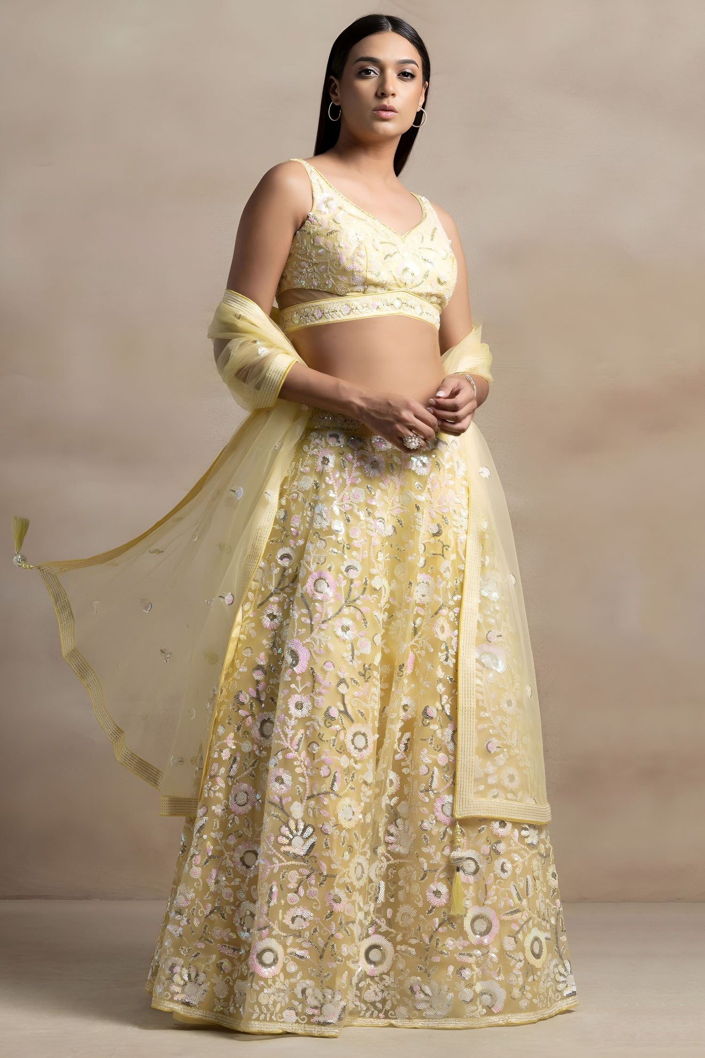Yellow Net Pastel Lehenga Choli with Sequins and Thread Work