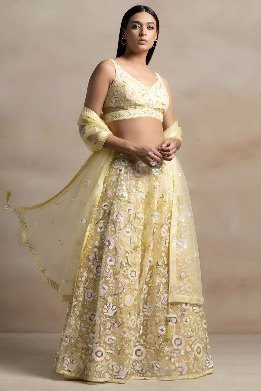 Yellow Net Pastel Lehenga Choli with Sequins and Thread Work