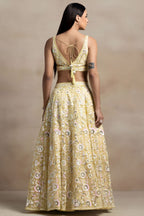 Yellow Net Pastel Lehenga Choli with Sequins and Thread Work
