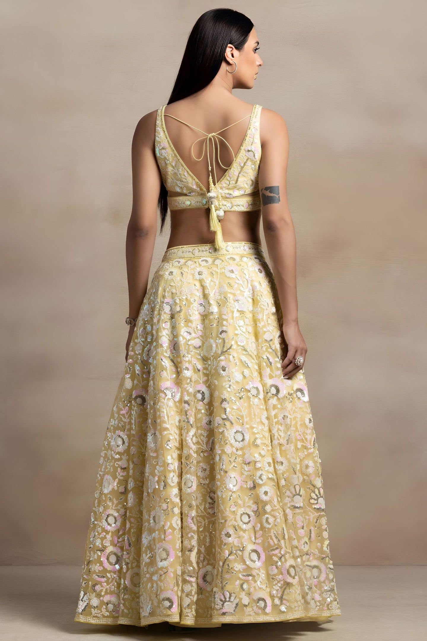 Yellow Net Pastel Lehenga Choli with Sequins and Thread Work