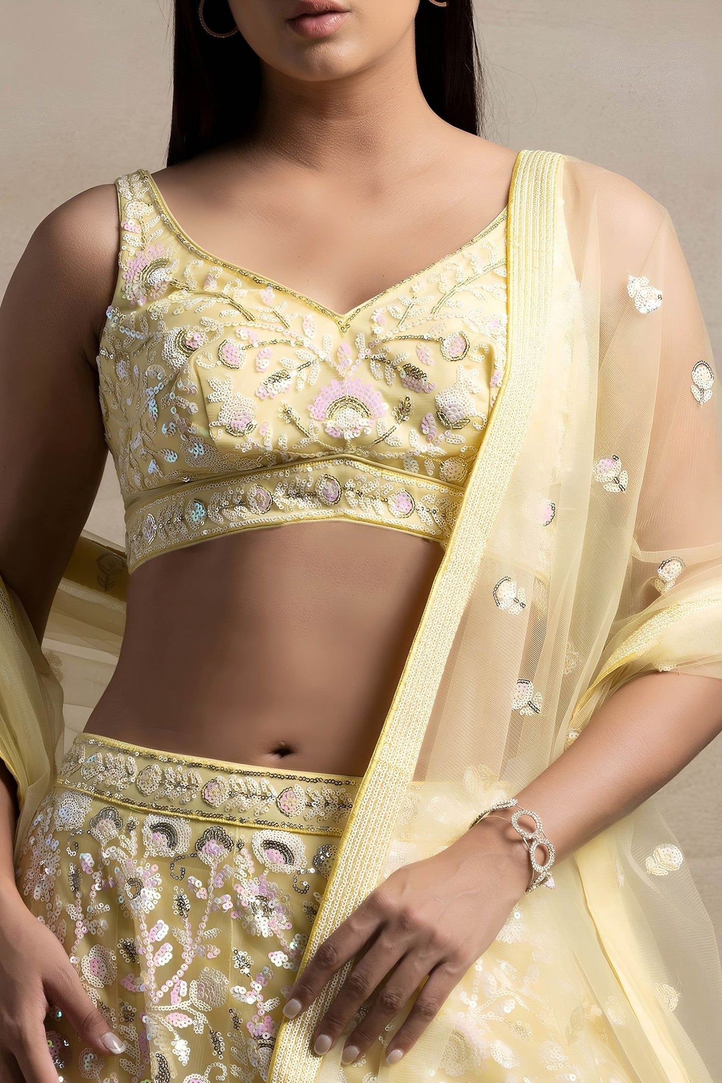Yellow Net Pastel Lehenga Choli with Sequins and Thread Work