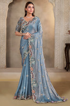 Powder Blue silk saree for wedding with pearl, thread and sequin handwork, full front view of the model wearing the draped saree