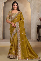 Mustard Olive haldi saree with pearl, thread and sequin handwork, full front view of the model wearing the draped saree