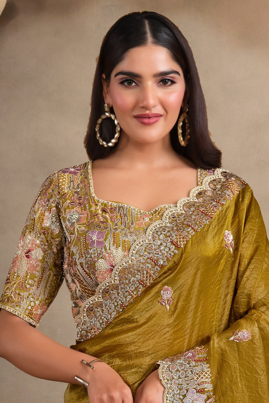 Mustard Olive sequin saree with pearl, thread and sequin handwork, front view showing the embellished blouse and detailed border