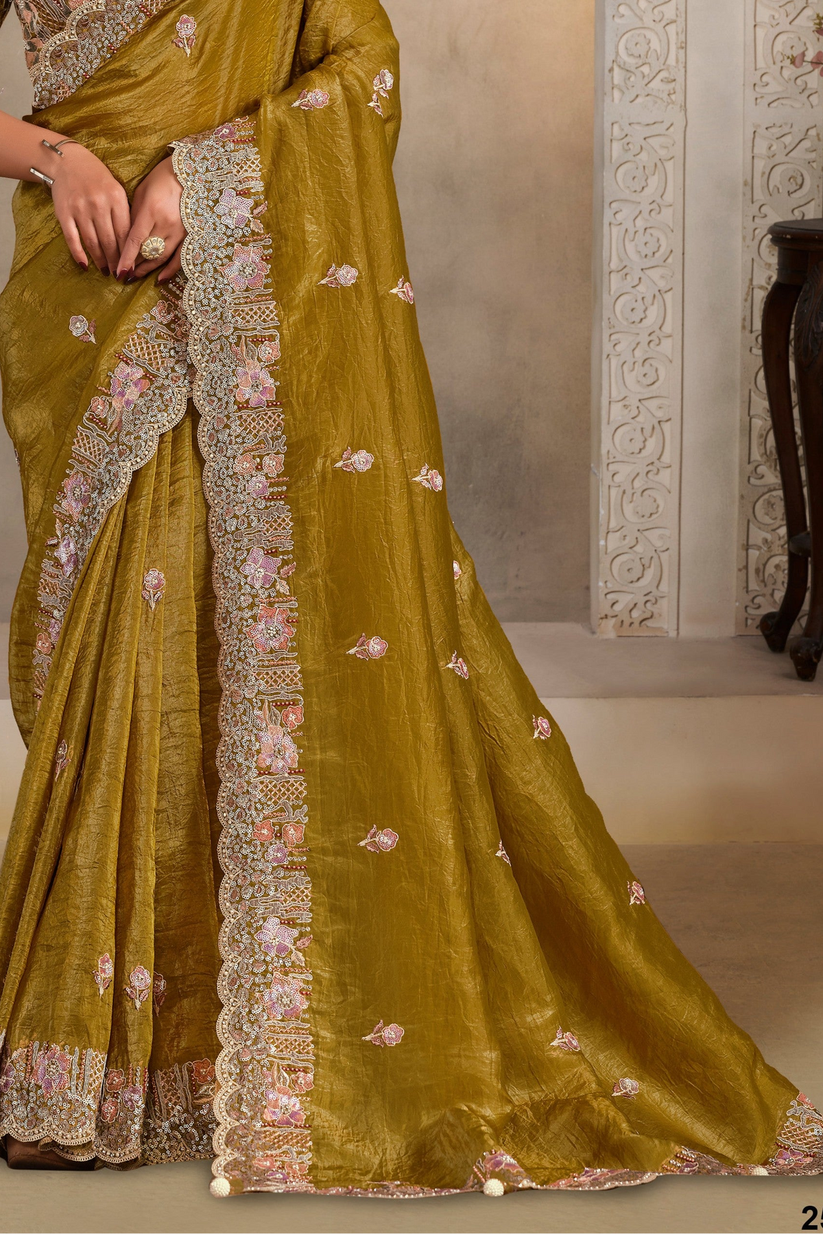 Mustard Olive satin saree with pearl, thread and sequin handwork, upper-body closeup of the embroidery and handwork detailing