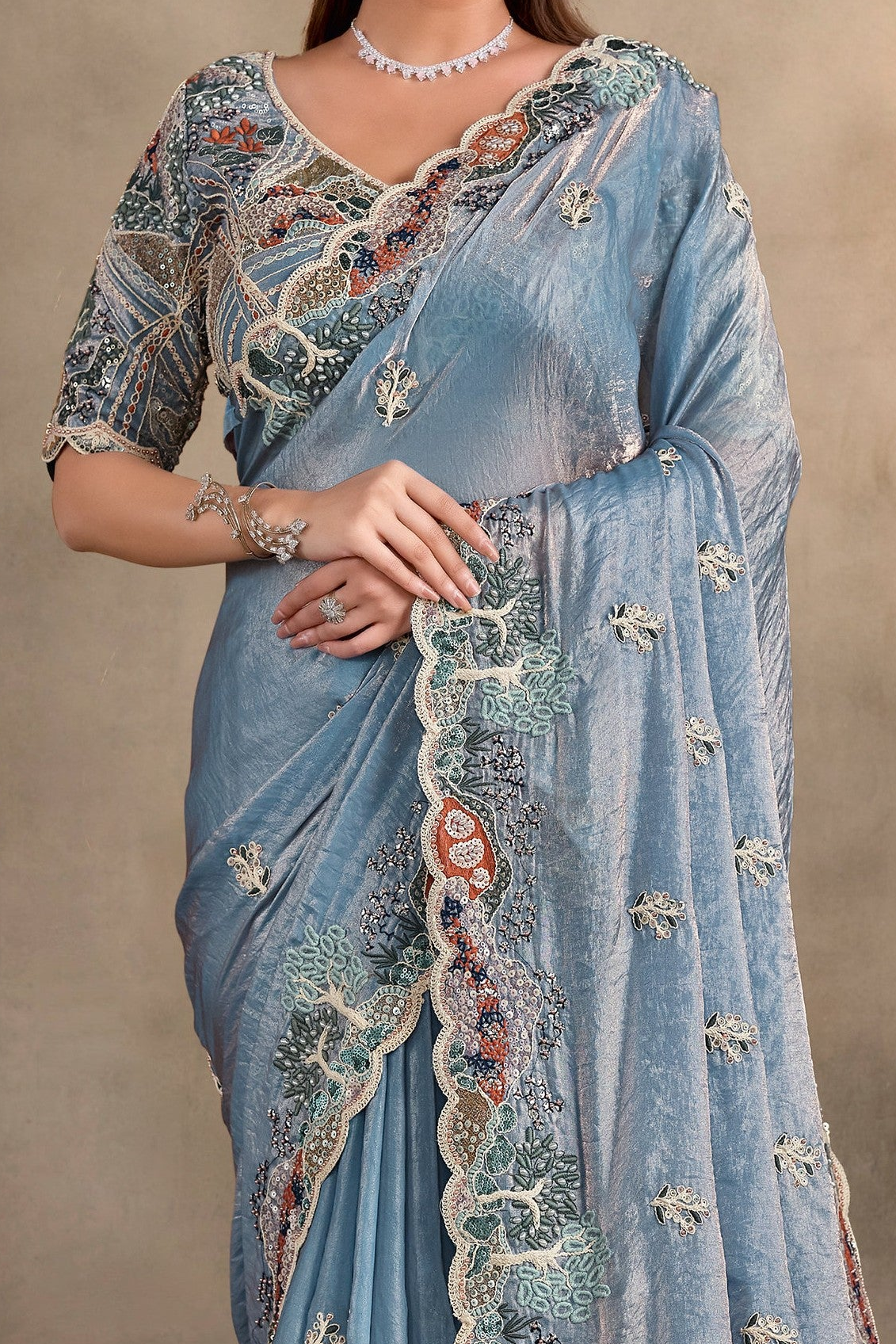 Powder Blue bridesmaid saree with pearl, thread and sequin handwork, upper-body closeup of the embroidery and handwork detailing