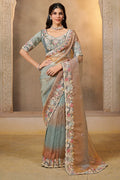 Dusty Blue saree for engagement with stone and thread handwork, full front view of the model wearing the draped saree