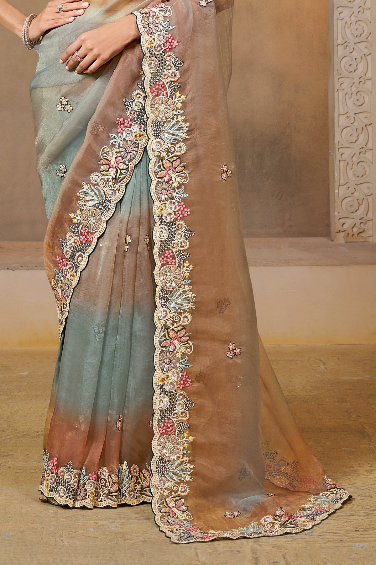Dusty Blue bridesmaid saree with stone and thread handwork, upper-body closeup of the embroidery and handwork detailing