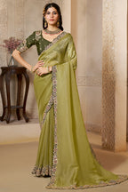 Olive Green wedding guest saree with sequin and stone handwork, full front view of the model wearing the draped saree