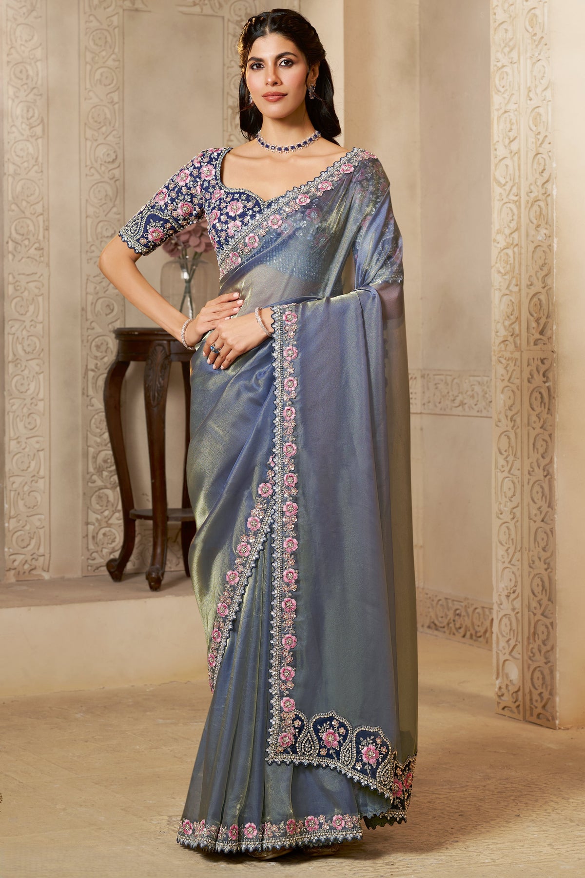 Slate Blue organza saree with pearl, stone and thread handwork, full front view of the model wearing the draped saree