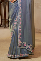 Slate Blue bridesmaid saree with pearl, stone and thread handwork, upper-body closeup of the embroidery and handwork detailing