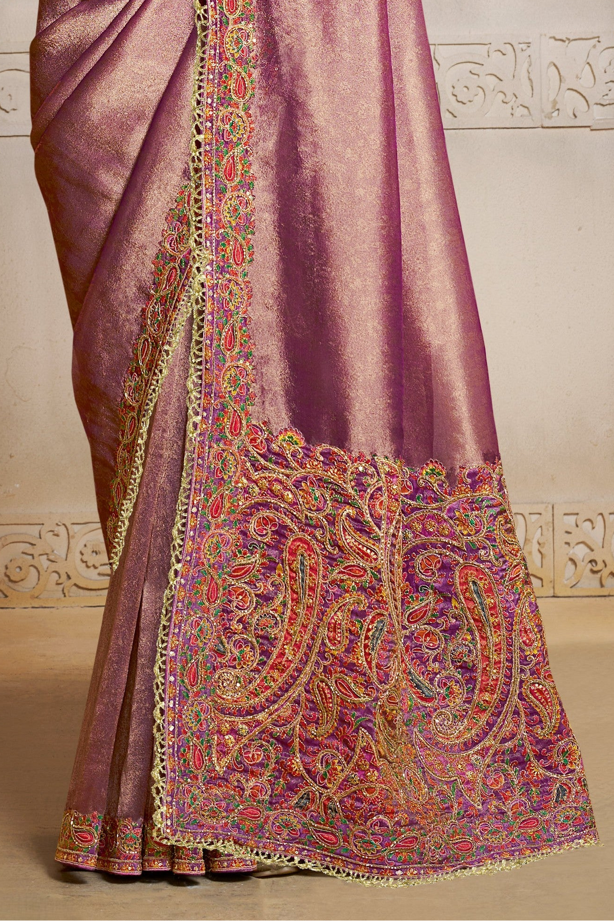Muted Purple satin saree with print and embroidery handwork, waist-down view of the pleats and flowing saree drape