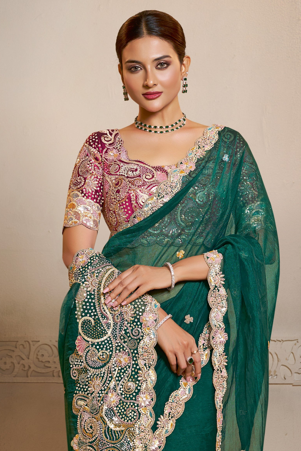 Emerald Green embroidered saree with thread embroidery and stone handwork, waist-down view of the pleats and flowing saree drape