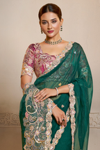 Emerald Green embroidered saree with thread embroidery and stone handwork, waist-down view of the pleats and flowing saree drape