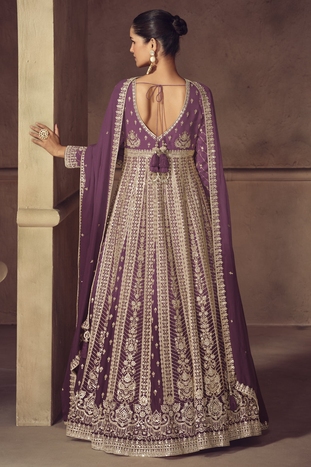 Back view of purple anarkali gown with embroidered churidar and dupatta