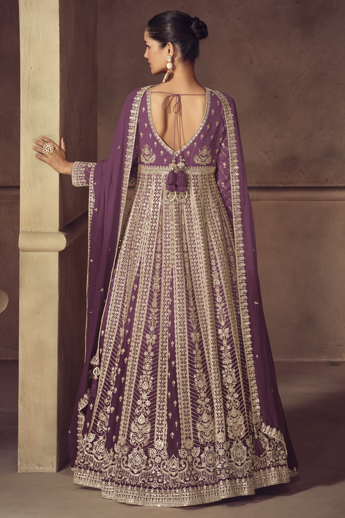 Back view of purple anarkali gown with embroidered churidar and dupatta