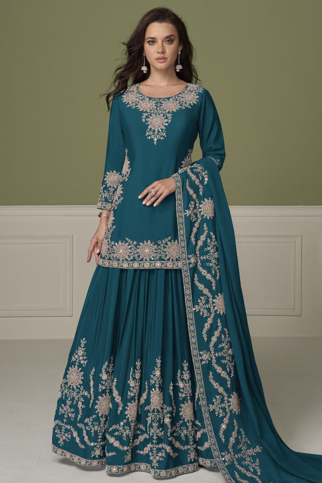 Dark teal kurta sets for women, full front view on model, chinon silk kurta with skirt and hand embroidery.