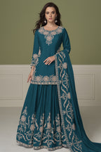 Dark teal kurta sets for women, full front view on model, chinon silk kurta with skirt and hand embroidery.