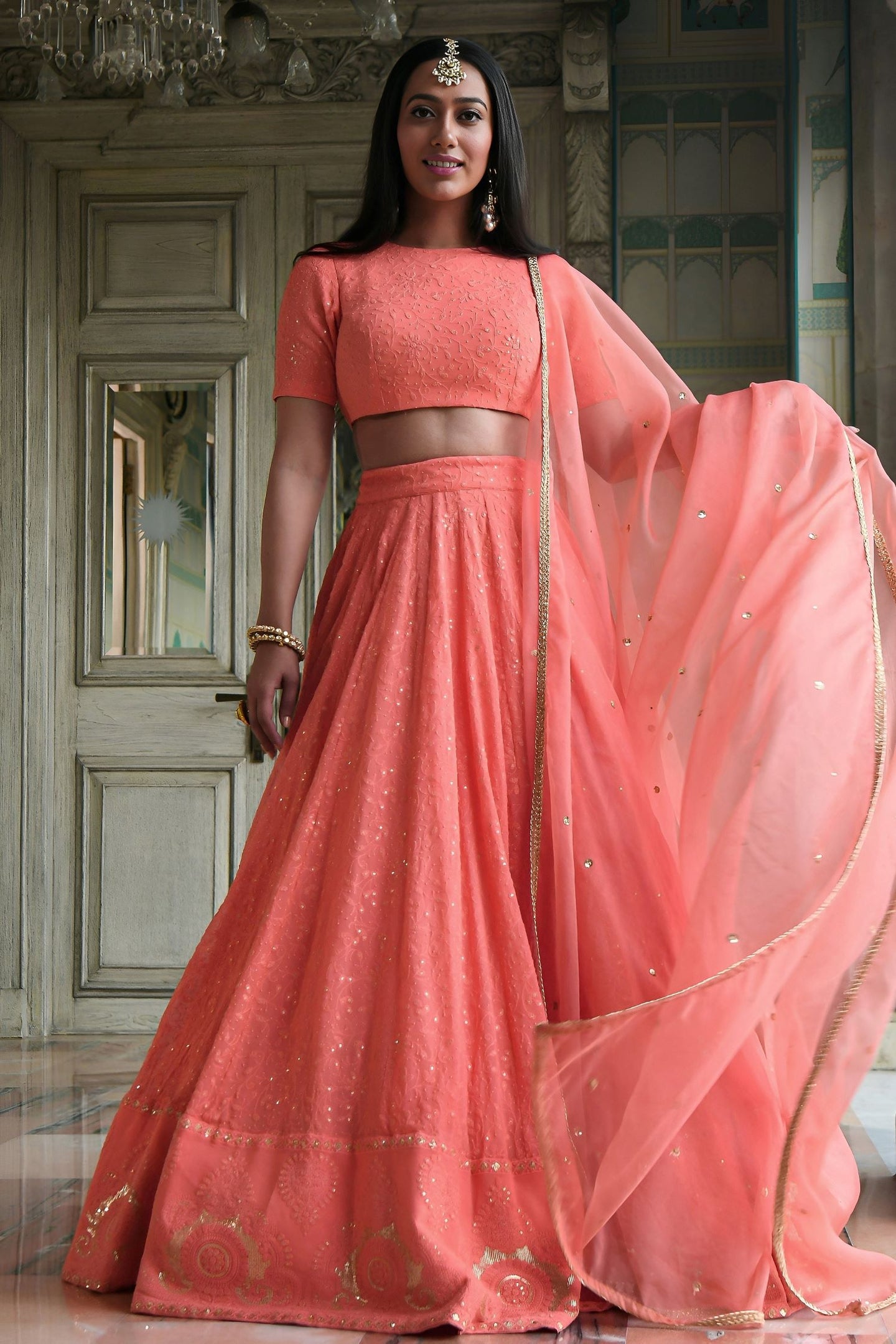 Peach Georgette High Neck Lehenga Choli with Gota Patti and Sequins Work