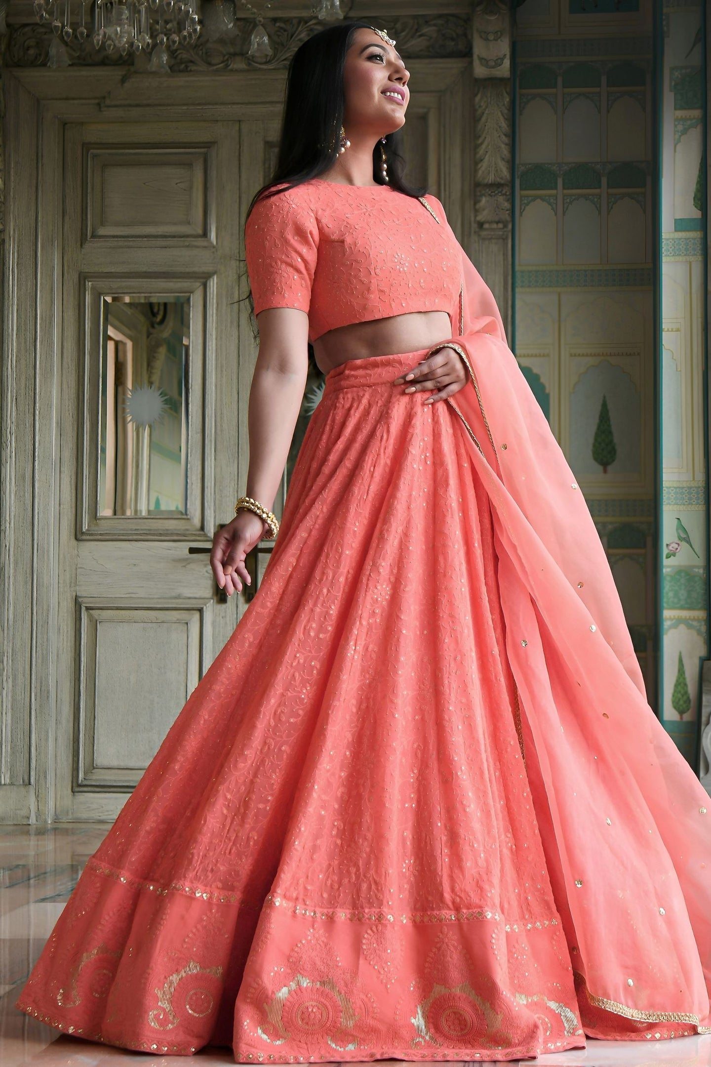 Peach Georgette High Neck Lehenga Choli with Gota Patti and Sequins Work