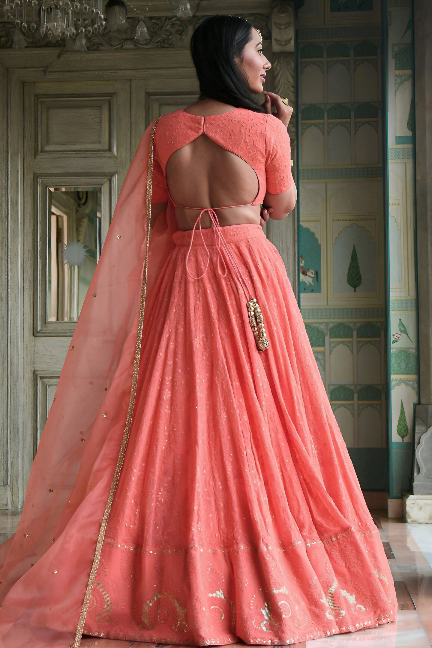 Peach Georgette High Neck Lehenga Choli with Gota Patti and Sequins Work