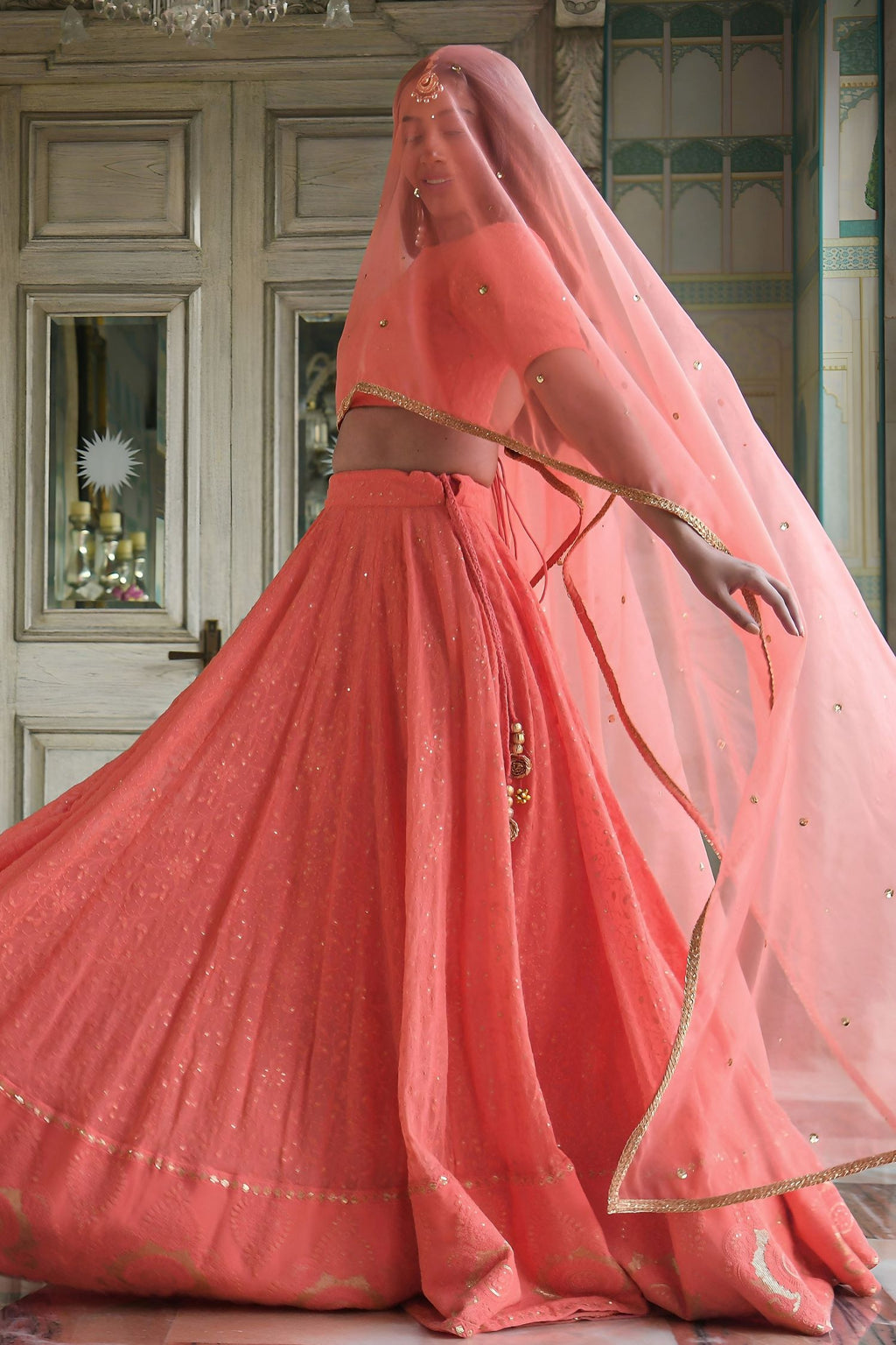 Peach Georgette High Neck Lehenga Choli with Gota Patti and Sequins Work