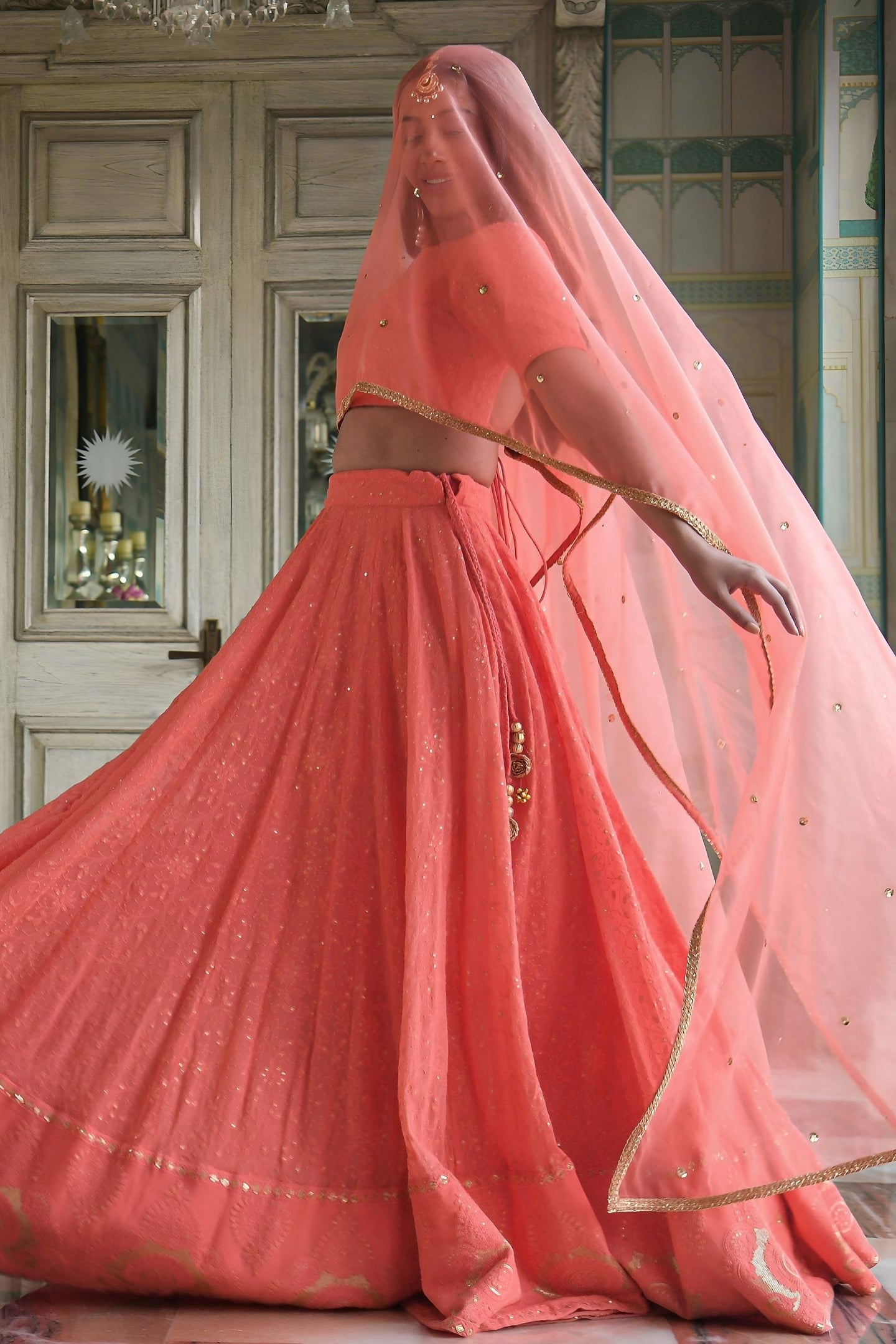 Peach Georgette High Neck Lehenga Choli with Gota Patti and Sequins Work
