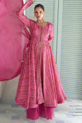 Fuchsia pink chinon silk kameez with plazo and a flowing dupatta, front view with print and sequin work.