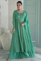Emerald green chinon silk kameez with plazo and dupatta, front view with print and sequin work.