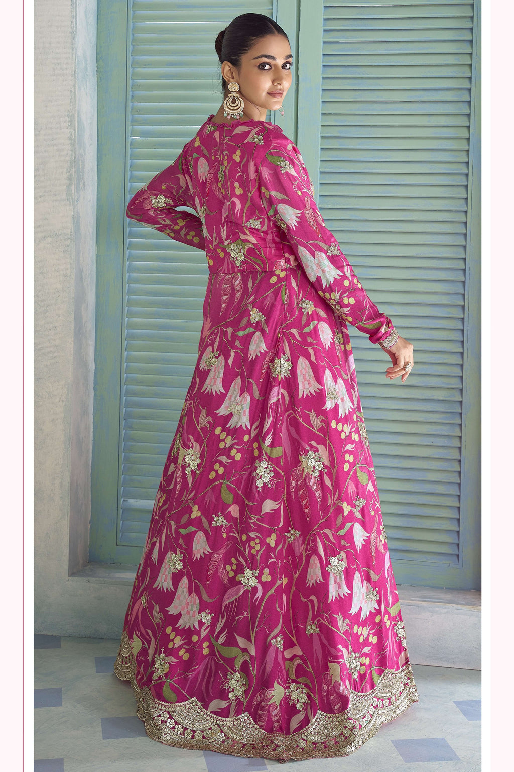 Back view of the hot pink palazzo suit, showing the floral jacket flowing over the plazo pants.