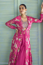 Detail shot of the hot pink palazzo suit's thread and sequins embroidery on chinon silk.